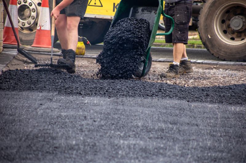 Asphalt driveway enhances the curb appeal